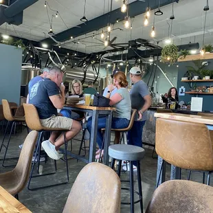 a group of people sitting at a table