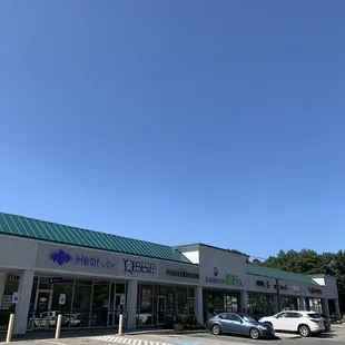 Outside--in a plaza so ample parking
