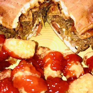 Chilaquiles breakfast torta &amp; tater tots