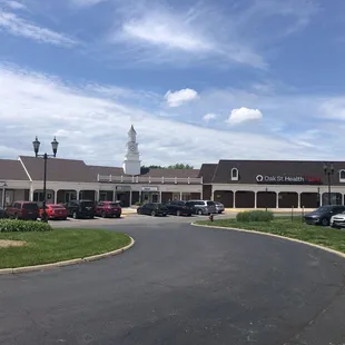 Storefront under the white steeple.