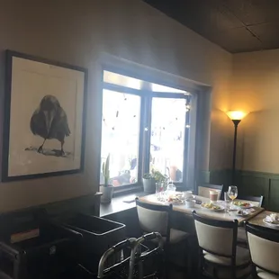 Table by the front window.