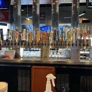 a bar with beer taps