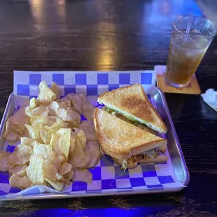 The chicken sandwich and chips.