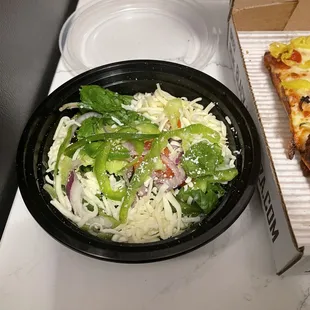 The sad $9 salad. Hard to tell from this angle but it's mostly cheese.