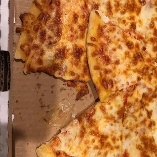 Yes, that's tape or plastic dough wrapping that I pulled out of my pizza. Disgusting. Never eating here again.