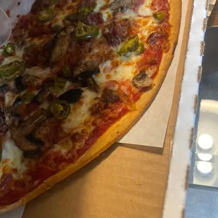 a slice of pizza in a box
