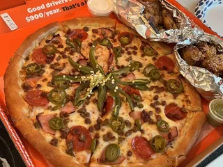 Que' Pizza & Tacos