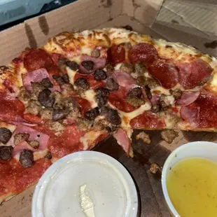 a slice of pepperoni and sausage pizza