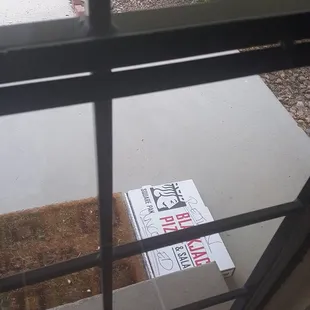 Half eaten, uncooked pizza that the "manager" said they had to come back for inordwe to issue our refund.