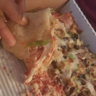 Half eaten, uncooked pizza that the "manager" said they had to come back for inordwe to issue our refund.