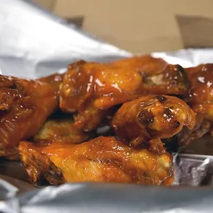 chicken wings wrapped in foil