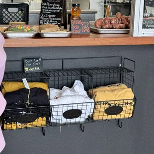 a woman standing in front of a counter