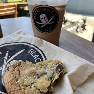 Iced Mocha with Oatmilk and Salted Chocolate Chip Cookie enjoyed in restaurant outdoor patio.