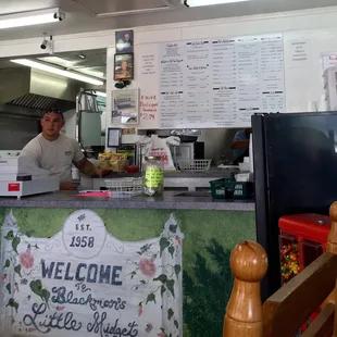 a man behind the counter