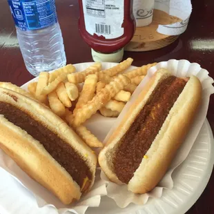 Chili dogs with fries.