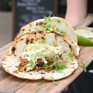 a person holding a plate of food