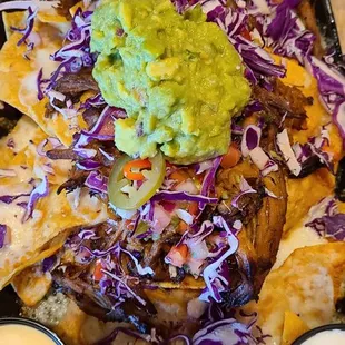 Nachos with Pulled Pork lime crema on the side