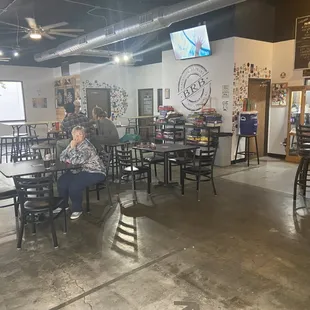 a woman sitting at a table