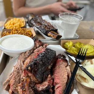 Brisket (1.5 lbs for scale) and the dino rib
