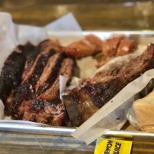a tray of meat and cheese