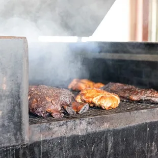 smoke coming out of the grill
