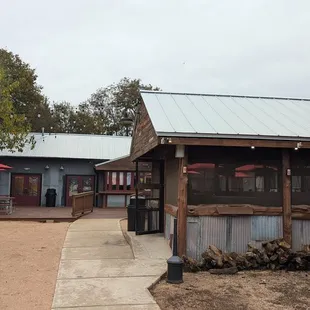 Coming in from parking lot, smokehouse on right