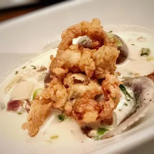 Lobster Hot Pie is really good! Grilled Calamari is must have - grilled to perfection! New England Clam Chowder - fine, tasteful