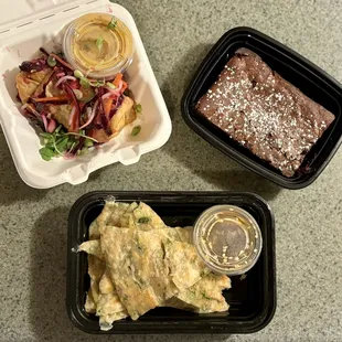 (Clockwise from upper left) Brisket egg roll with honey mustard sauce, miso choc. brownie and scallion pancakes with soy molasses sauce