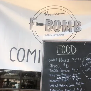 a menu and a chalk board