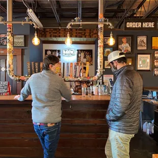 two men at the bar