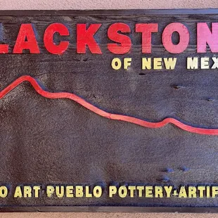 Sign that directs you to the Shop