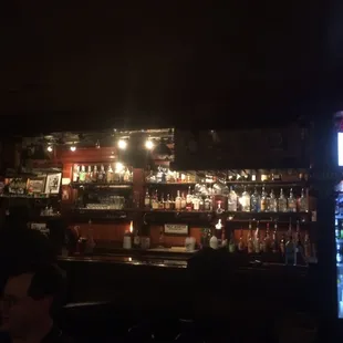 a bar with a lot of bottles