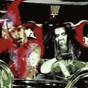 a group of people riding in a carriage