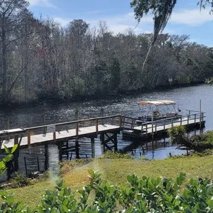 a view of a dock and boat