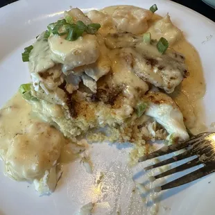 Flounder with shrimp served over cornbread with andouille