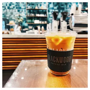 a cold beverage in a plastic cup