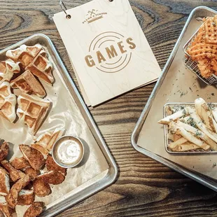 (Left) Chicken and Waffles served with a Chipotle Honey Sauce- YUM! (Right) Sweet Potato Fries and Seasoned Fries.