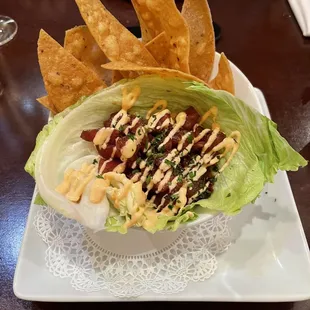 Poke Too heavy on the sauce and a little sweet for my taste. The tuna was of poor quality and not cut consistently.