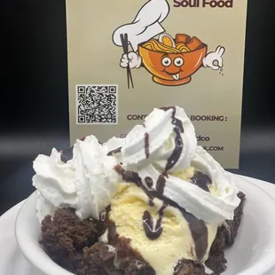 Brownie topped with whipped cream, Hot fudge &amp; Ice cream