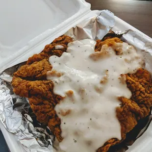 Chicken fried steak to go was huge and yummy.