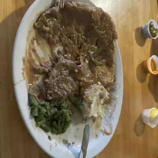 Chicken fried steak, greens beans and mashed potatoes w/ brown gravy