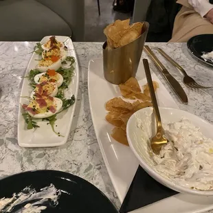 Deviled eggs, French onion dip and chips