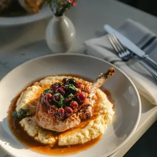 Pork with wine grapes and polenta