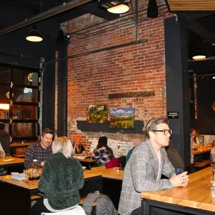 Blanchard Family Wines was warm and inviting with exposed brick, wood beams, wine barrels and iron hardware throughout.