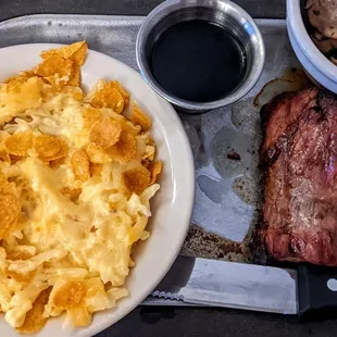 a plate of food and a knife