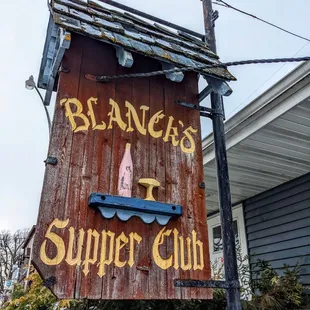 the sign for blanck's supper club