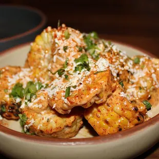 The &quot;Esquites&quot; Mexican Street Corn is made with mayo, cilantro, lime, and cotija cheese.