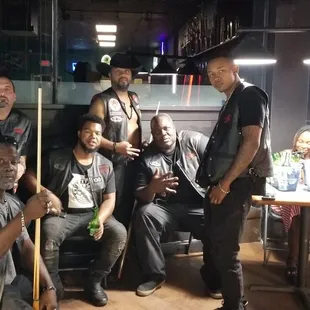 a group of men posing for a picture