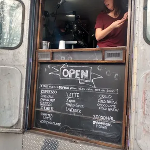 a woman looking out the window