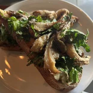 Mushrooms were perfectly prepared on this mushroom toast